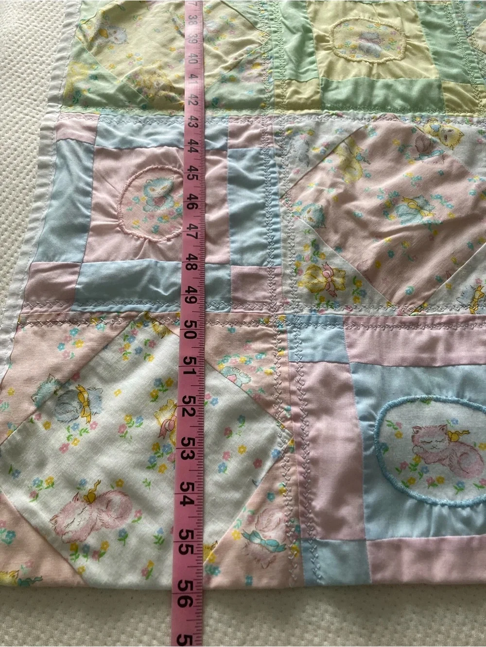 Handmade pastel kitten print baby quilt
